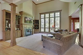 2 story Great Room - Custom built-ins, flanking columns frame the space