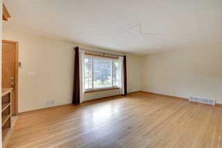 Hardwood floors - generous picture window.