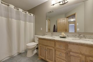 Hall bath with new granite countertops, cabinetry pulls, modern faucets 
