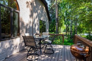 Private deck overlooks woods and distant pond