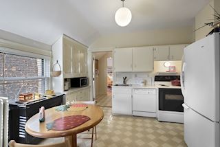 Second floor Kitchen awash with light from corner window and pantry
