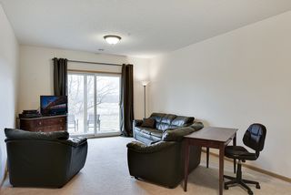 Inviting family room walking out to patio and views of 14th fairway...