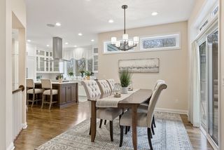 Informal dining leads to deck and open to the great room and kitchen.