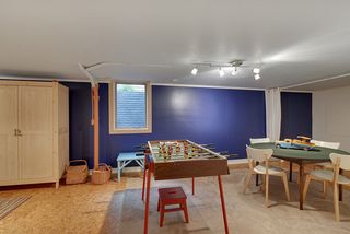 The Lower Level Rec Room/Family Room features a Wood Floor & Egress Window... Possible Bedroom #4?