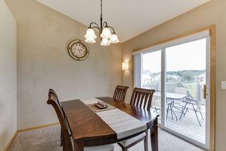 Get a little more formal with a larger dining space leading to the deck