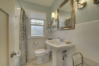 Built in mirrored medicine cabinet and glass tile accents. 