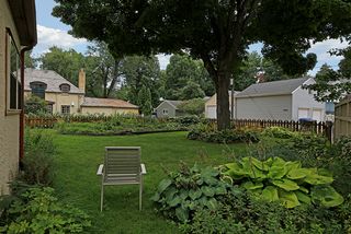 5024 Park Avenue - Relax and enjoy the beautiful gardens on this double lot
