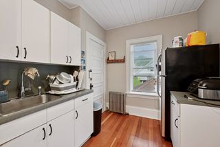 View of Kitchen in Apt #3.
Features Hardwood floors, newer thermal pane vinyl windows, newer appliances, Shiplap Ceiling and lighting.