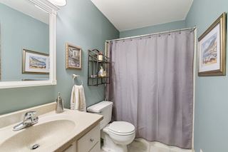 Bath with tub/shower combination.