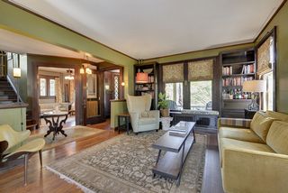 The Living Room features HUGE Windows and Built-In Book Shelves! 