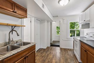 Separate rear staircase entry with inside access to shared basement with laundry