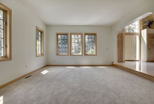 This formal Living space is off the main floor Family Room - perfect for those large gatherings.