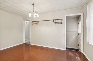 Dining Room also leads to the side door and stairs to the Lower Level  Amusement Room, Laundry and Workshops