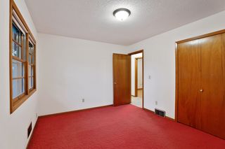 Owners Suite with large double window and closet. The home's Upper 2nd Level has three Bedrooms, a Full Bath, and a hallway Linen Closet.