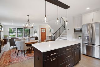 A view of the main floor and open staircase