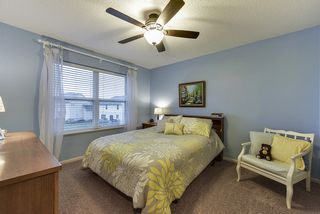 Bedroom 2 on the upper level with views of the back yard