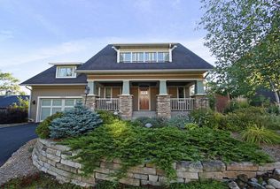 Professionally landscaped yard area, natural dry laid chilton stone walls, with underground irrigation.