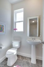 Private powder room with lovely tile floors - 3942 Campello Curve