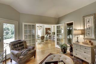 Sunroom is vaulted and has a ceiling fan and new door!
