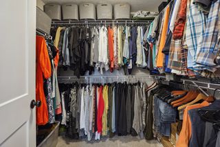 Abundant storage is offered in the owners' walk-in closet.