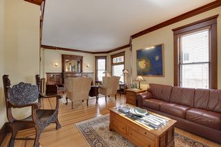The Entertainment Sized Living Room features Hardwood Floors...
