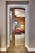 The Private Den/Library is located off of the Formal Living Room...