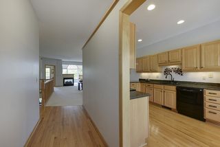 Kitchen conveniently located near front door and garage entrance...