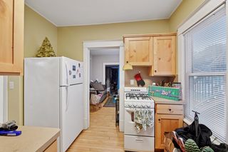 Another View of Kitchen in Apt #1.
Features updated kitchen with Custom Hickory Cabinets, Newer appliances, Hardwood floors and Thermal Pane Windows throughout.