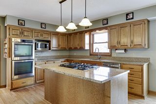 Stainless appliances, double ovens, gas cooktop and updated counters