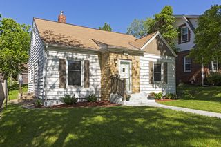 Lovely home on quiet tree-lined street 1/2 block from Creek...