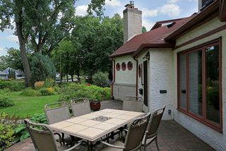 5024 Park Avenue - Enjoy the beautiful gardens on this double lot while dining with friends and family