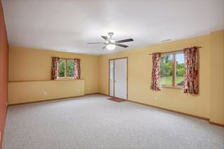 Huge 22.5 x 14.5 basement family room with walkout to paver patio in backyard