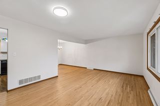 Open layout connects the living and dining areas