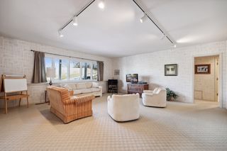 Spacious lower level family room with 9' ceilings.