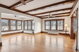sunroom and living room looking toward W River Parkway