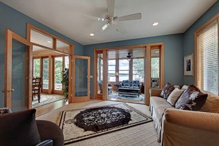 Sitting space with adjoining screen porch.