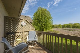 Relax on inviting deck overlooking wetlands...