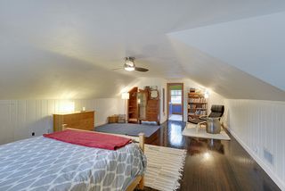 Master Bedroom #1 is your own "Retreat" away from the rest of the home... enjoy the Dormers, Hardwood Floors & Private Half-Bathroom.