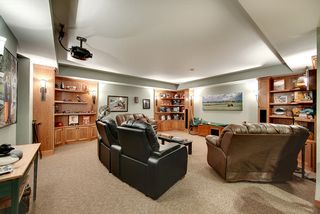 Lower level Entertainment space. In floor heat, custom cherry cabinetry.