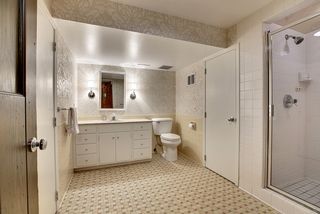 The Lower Level features this 3/4 Bathroom with original Floor Tile...