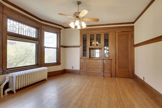 The Formal Dining Room features this beautiful Built-In Buffet & Leaded Glass Windows...