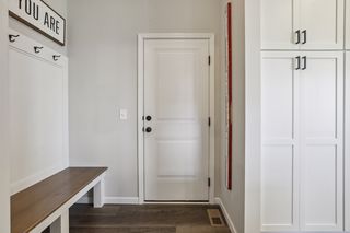 This practical mudroom adjoins the garage through the service door.