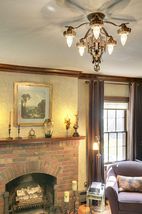 You will find Original Light Fixtures in the Beautiful Living Room...