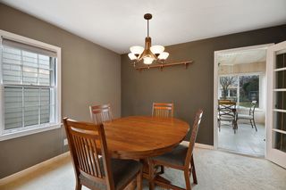 Dining room with door leading out to back porch
