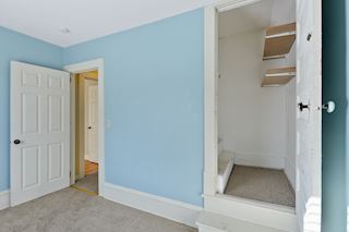 Bedroom 4 with walk up attic access through closet