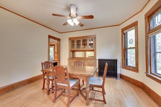 The Dining Room features an Original Built-In Buffet, Leaded Glass Windows & Hardwood Floors...