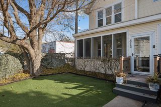 Fully Fenced front yard with no mow artificial grass