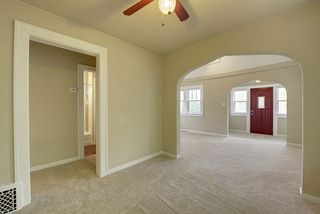 Arch repetition, oversized trim, neutral colors, pop of red! 