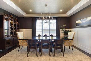 Enjoy entertaining family and friends in this elegant formal dining...