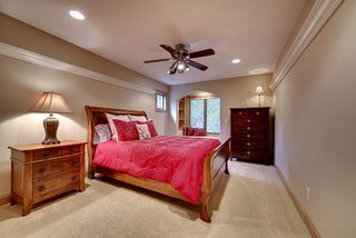 Bedroom 3 with built in window seat and shelving.